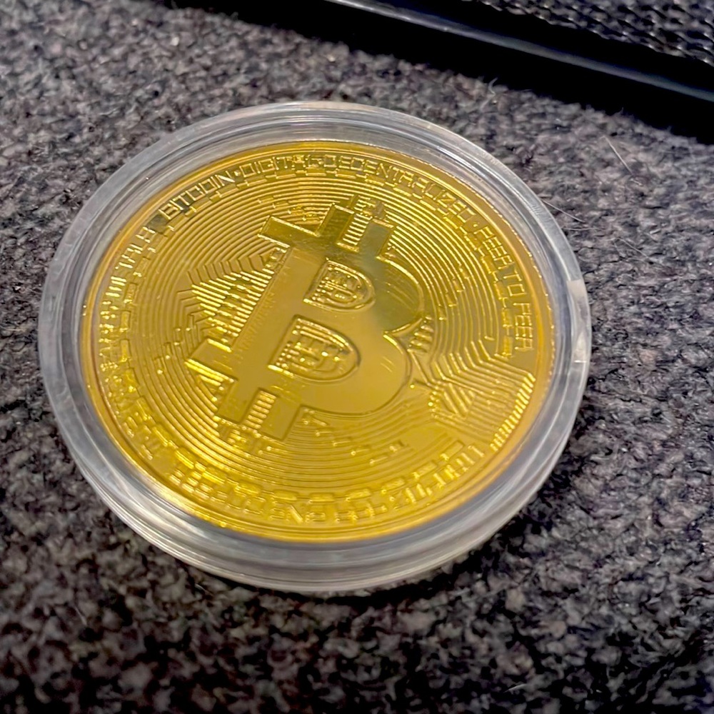 Bitcoin in collector container. So cool for the collectors in your life